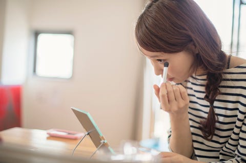 Woman have a make up in room