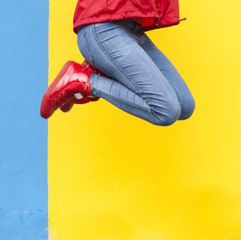 Woman in red sneakers