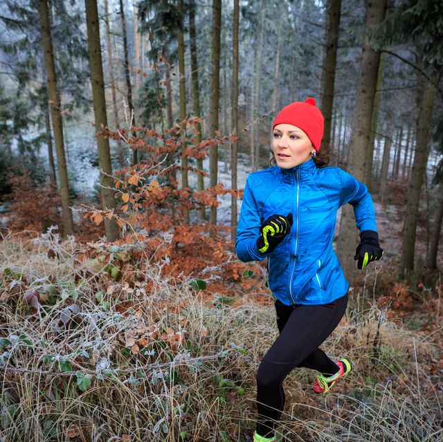 woman jogging in forest