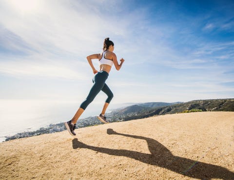 Woman jogging on mountain