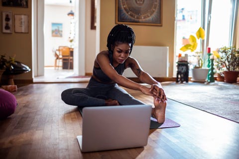 woman learning the janu sirsasana pose