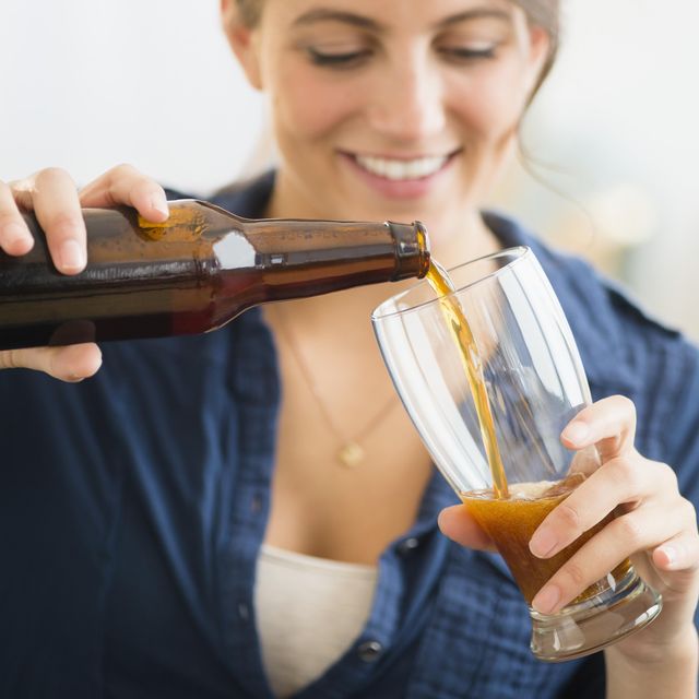 woman pouring beer