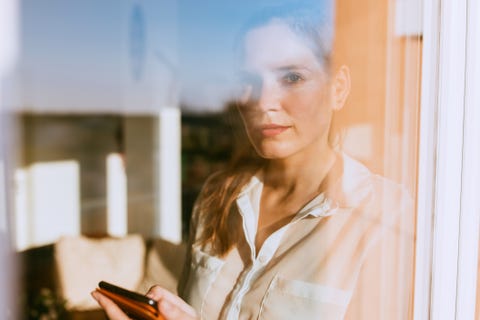 Woman using mobile device.