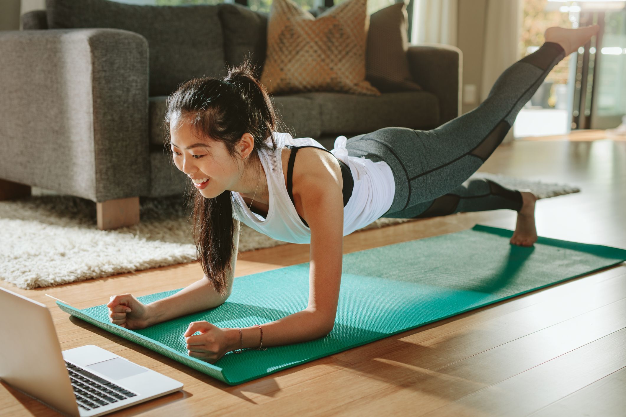 A 28-day full body home workout plan you can do in your living room