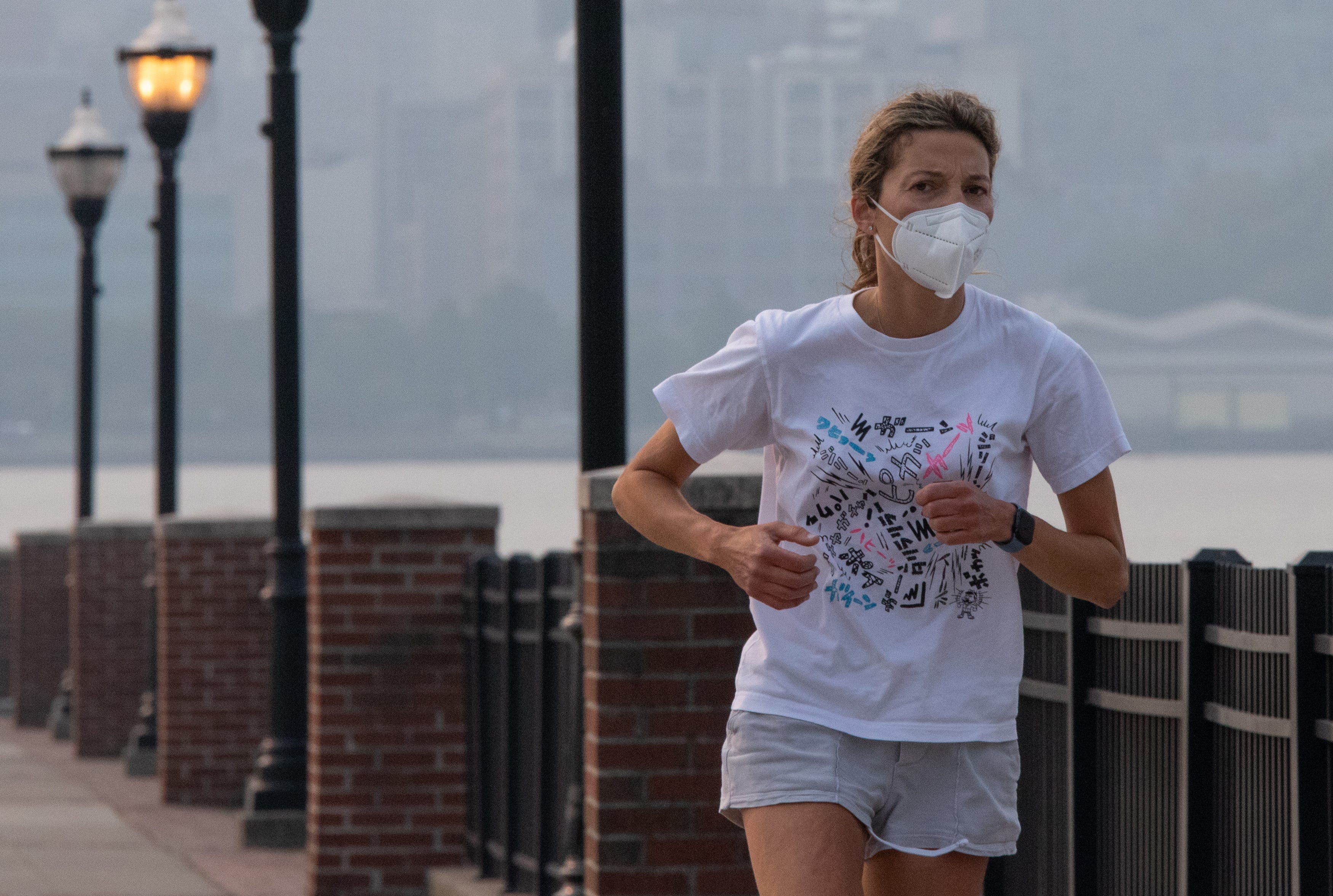 Here’s What to Know About Running Outside With Wildfires Affecting Air Quality