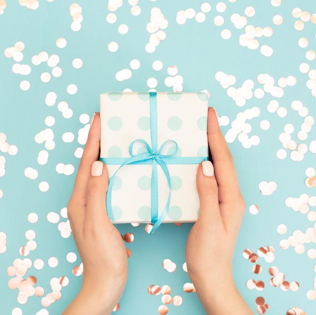 woman's hands holding gift or present