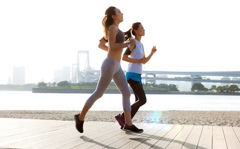 Women getting fit taking run afterwork in Tokyo
