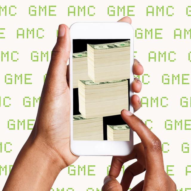 woman's hands holding a phone on a background of gme and amc stock symbols