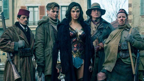 Gal gadot surrounded by her companions in 'wonder woman'