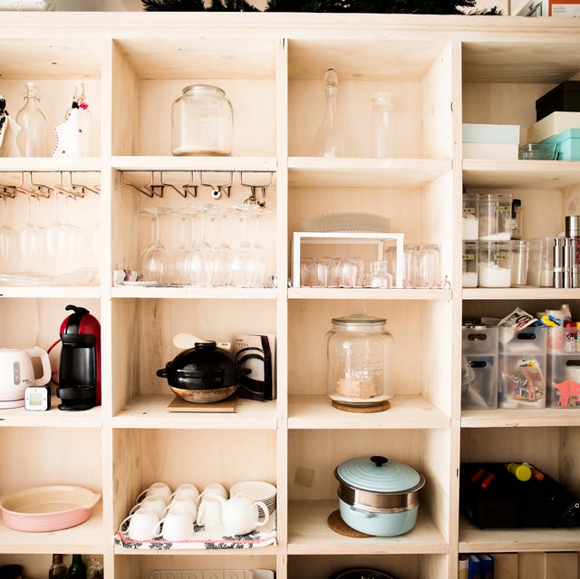 Wooden shelves with dishes arranged wooden shelves with dishes arranged