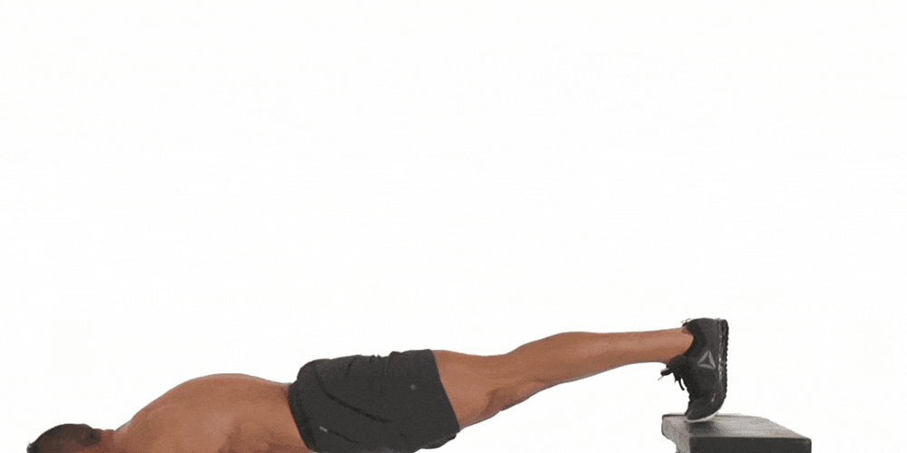 How To Do The Feet Elevated Plank Mens Health 