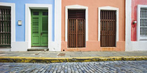 Puerto Rico, Old San Juan, door in houses on brick street