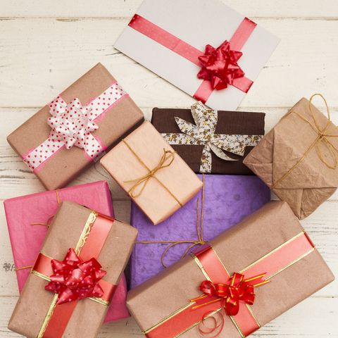 Wrapped gifts on wooden table