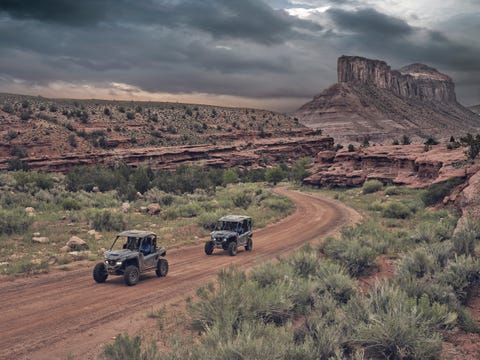two yamaha wolverines on a trail