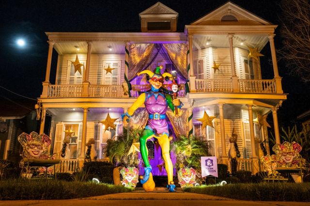 a new orleans home decorated for mardi gras 2021, also known as 