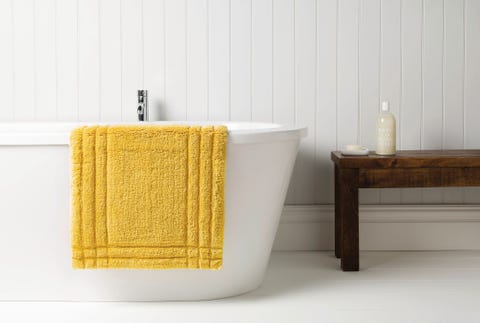 yellow bath mat, christy﻿