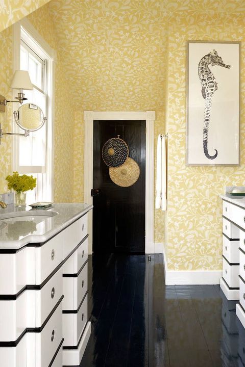 bathroom with yellow floral wallpaper 