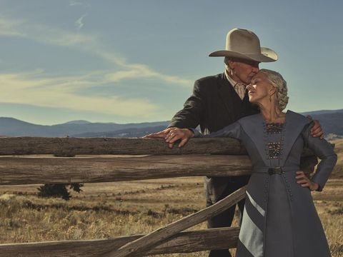 harrison ford and helen mirren share a kiss standing out in the countryside in yellowstone 1923