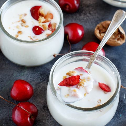 yogurt in jars with cherries and walnuts