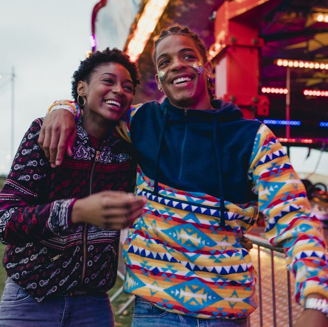 young couple at a funfair