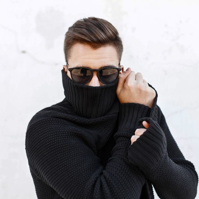 Young fashionable man in black sunglasses