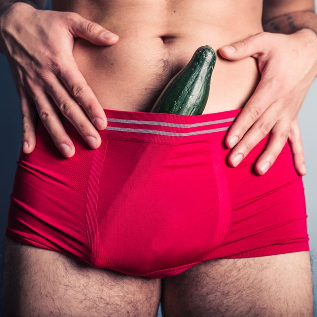 young man with cucumber in his underpants