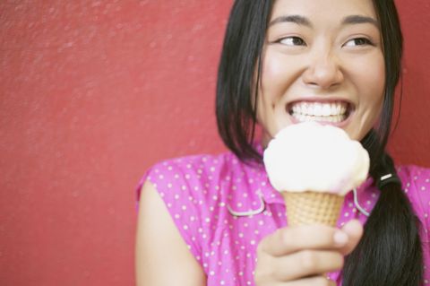 Young woman enjoying an ice cream cone