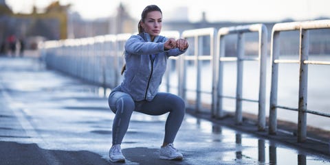 Young woman exercising outdoors Young woman exercising outdoors