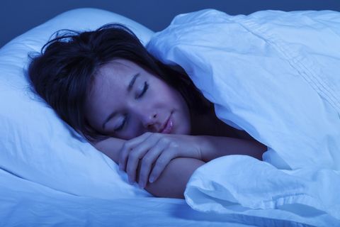 young woman sleeping blissfully