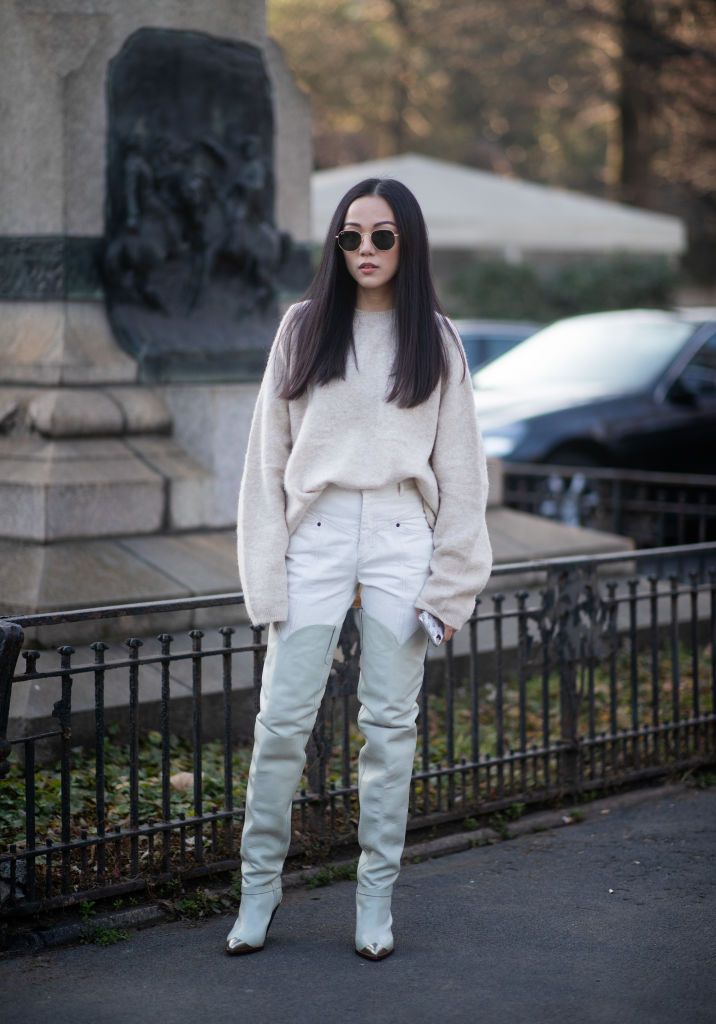 thigh high boots and jeans