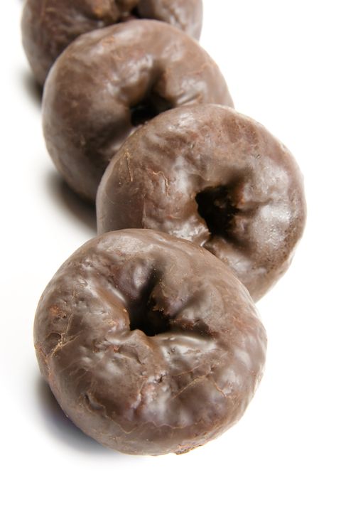 Yummy Chocolate Donuts on a white background.