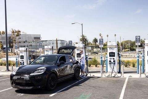 porsche macan ev prototype on a charger testing
