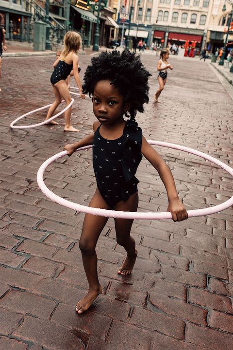 Hula hoop, Toy, Child, Performing arts, Fun, Architecture, Smile, Photography, Dance, Play, 