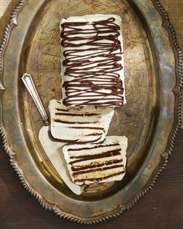 zebra semifreddo drizzled in chocolate on a vintage silver platter