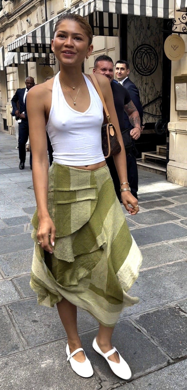 Zendaya Nails Parisian Cool in a Halter Top and Asymmetrical Maxi Skirt