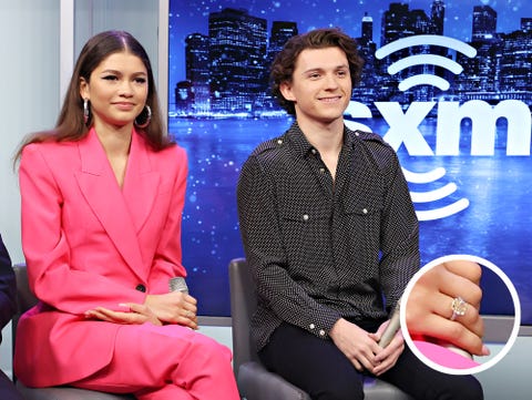 zendaya wearing a yellow diamond ring during her press tour