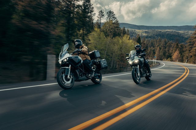 two people riding zero dsrx motorcycles on pavement
