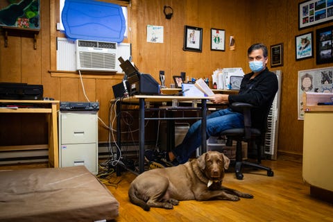 david oranchak at his computer with dog where he did most of his work to crack the code