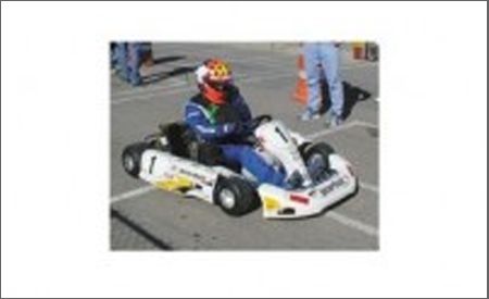 Mode of transport, Automotive design, Go-kart, Kart racing, Photograph, Automotive tire, Helmet, Asphalt, Race track, Motorsport, 