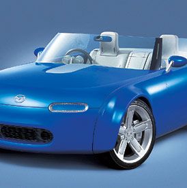 Automotive design, Blue, Vehicle, Automotive exterior, Car, Fender, Automotive mirror, Hood, Electric blue, Roadster, 