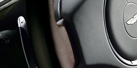 Grey, Vehicle door, Circle, Silver, Luxury vehicle, Leather, Carbon, 