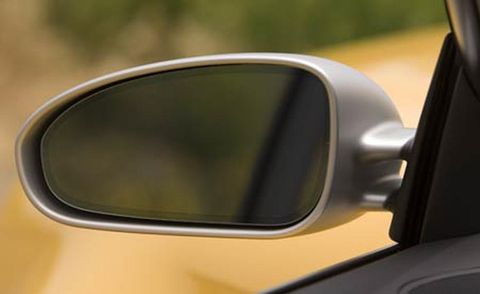 Motor vehicle, Mode of transport, Automotive mirror, Yellow, Automotive side-view mirror, Line, Light, Vehicle door, Fixture, Tints and shades, 