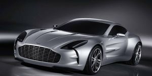 Automotive design, Mode of transport, Product, Vehicle, White, Car, Automotive lighting, Fender, Grille, Personal luxury car, 