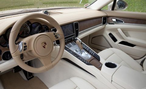 Motor vehicle, Steering part, Steering wheel, Vehicle, Center console, White, Vehicle door, Personal luxury car, Car seat, Luxury vehicle, 