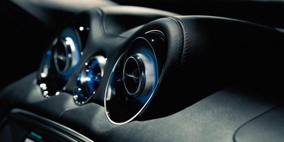 Motor vehicle, Automotive design, Steering part, Luxury vehicle, Personal luxury car, Steering wheel, Center console, Gear shift, Teal, Sports car, 