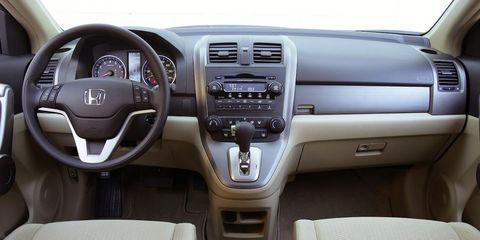 Motor vehicle, Steering part, Mode of transport, Product, Automotive design, Brown, Automotive mirror, Transport, Steering wheel, Center console, 