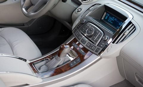 Motor vehicle, Mode of transport, Automotive design, Steering part, Steering wheel, White, Car, Center console, Luxury vehicle, Personal luxury car, 