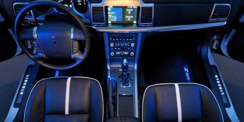 Motor vehicle, Automotive design, Transport, Center console, Steering part, Car, Vehicle audio, Steering wheel, Luxury vehicle, Personal luxury car, 