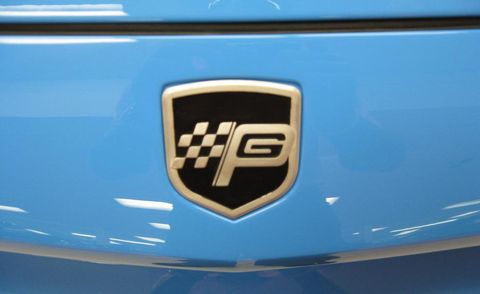 Motor vehicle, Blue, Automotive exterior, Electric blue, Logo, Symbol, Azure, Teal, Emblem, Trademark, 