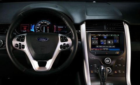 Automotive design, White, Steering wheel, Center console, Steering part, Vehicle audio, Luxury vehicle, Black, Grey, Technology, 